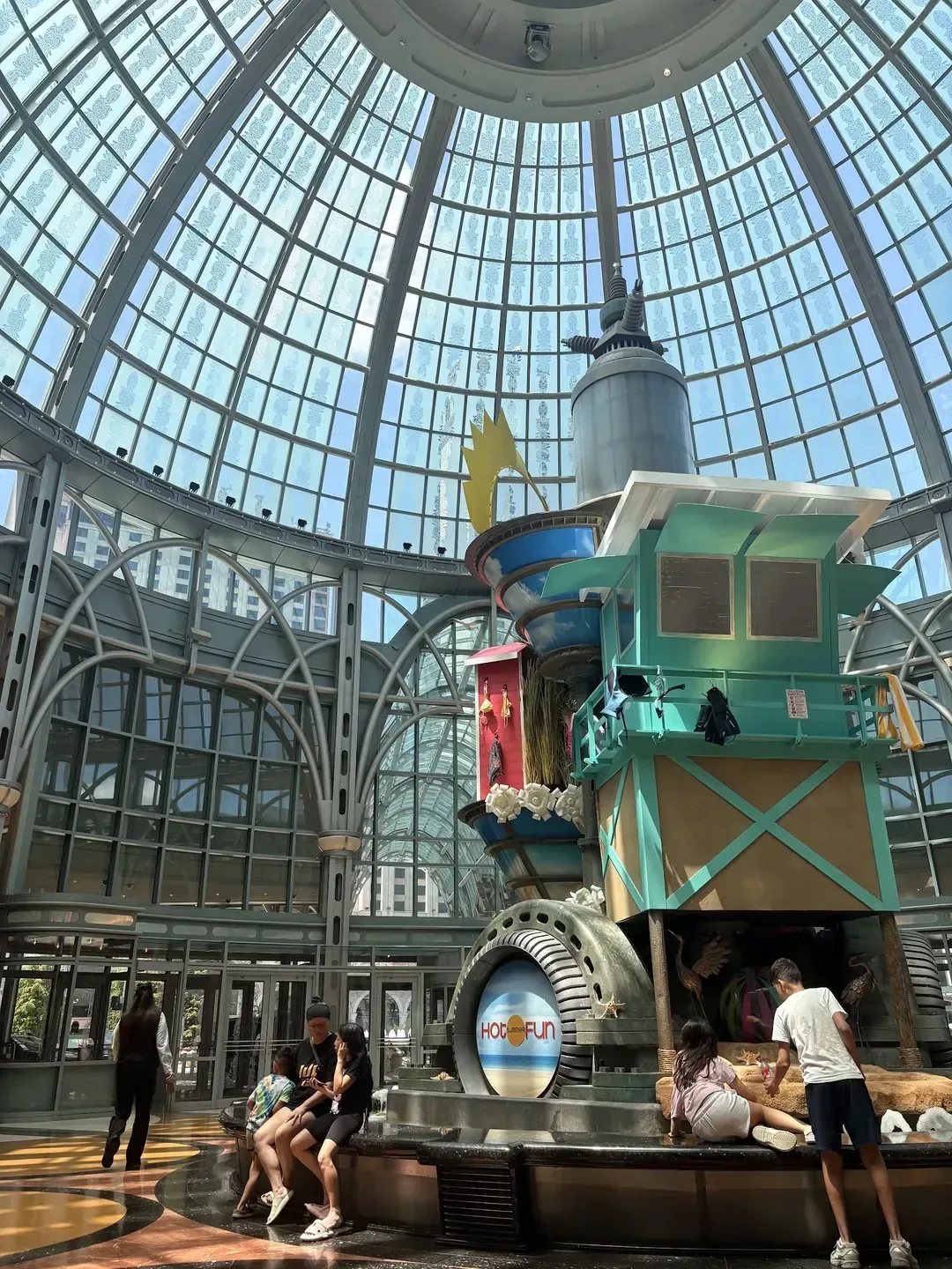 A glass-domed atrium at Fallsview Casino Resort, Niagara Falls, with daylight falling through the roof